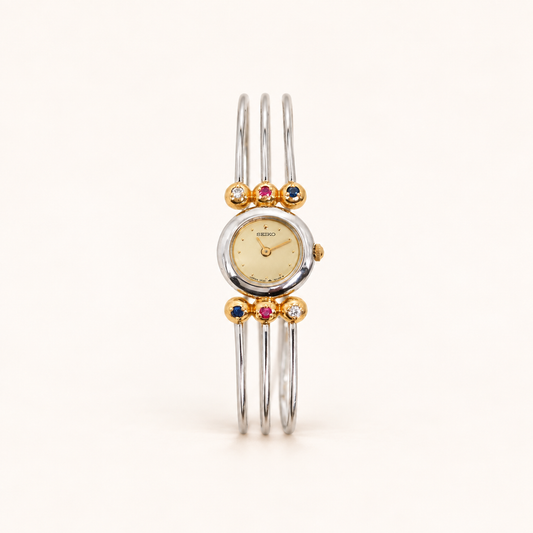 Seiko Vintage Round Face and Multi Gems Accents Tri-Wire Bangle Watch – Diorella vintage product cover