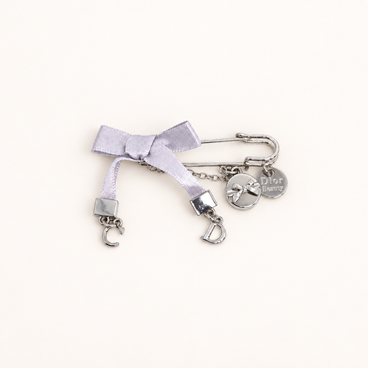 Christian Dior Vintage CD Logo with Ribbon Silver Brooch – Diorella vintage product cover