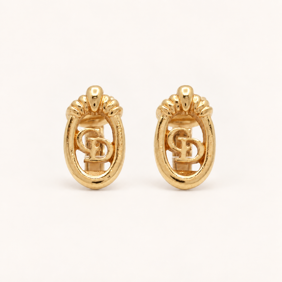Christian Dior Vintage Textured Oval CD Logo Gold-Tone Clip-On Earrings