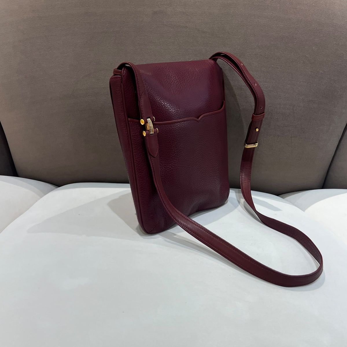 Cartier Burgundy Flap Backpack with Tassel Detail — opposite side angle