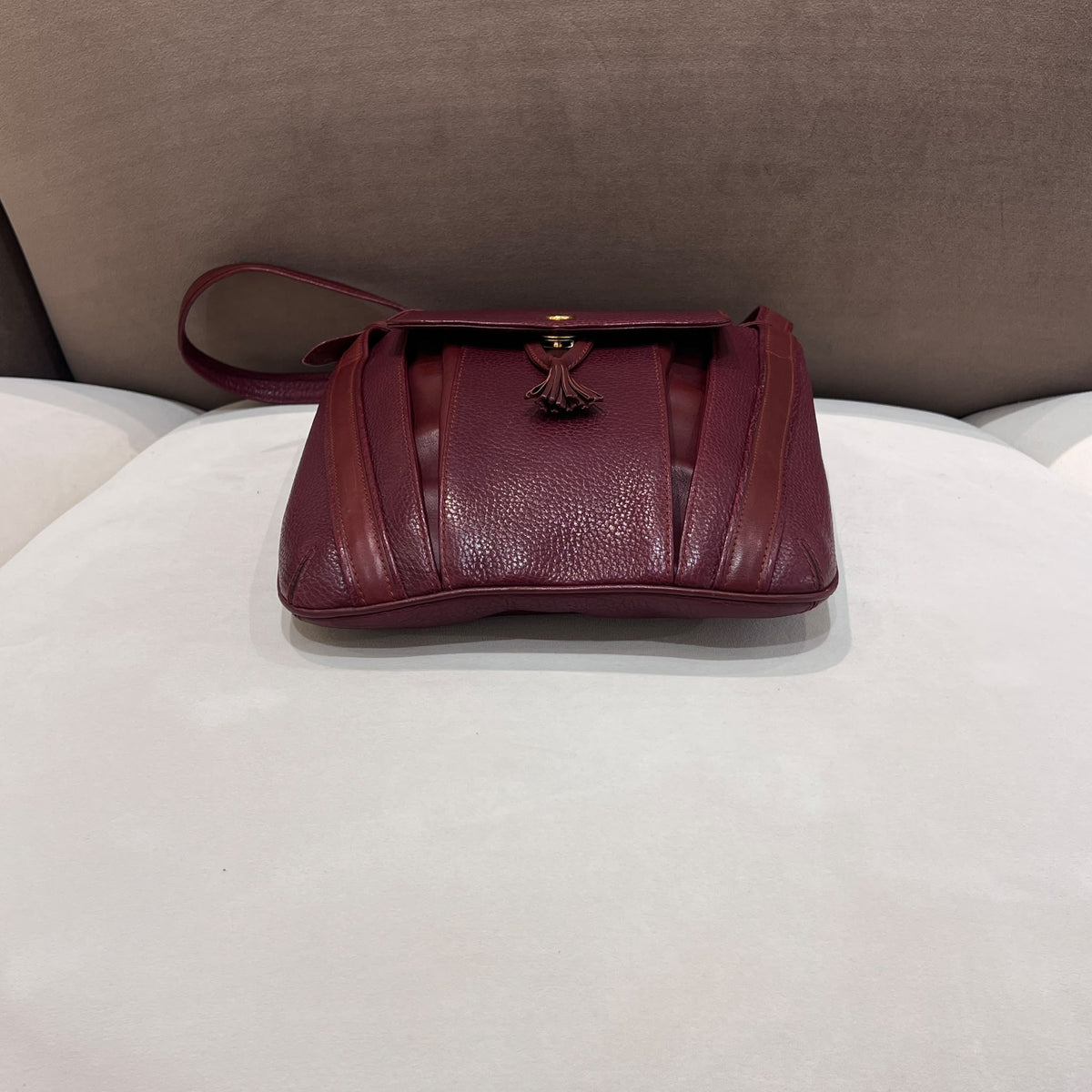 Cartier Burgundy Flap Backpack with Tassel Detail — base