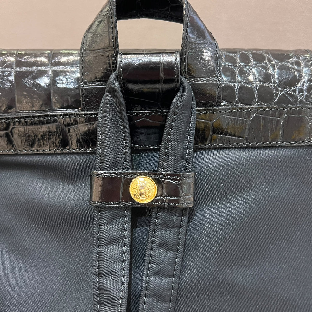 Versace Black Medusa Backpack with Croc-Effect Flap - top handle attachment detail