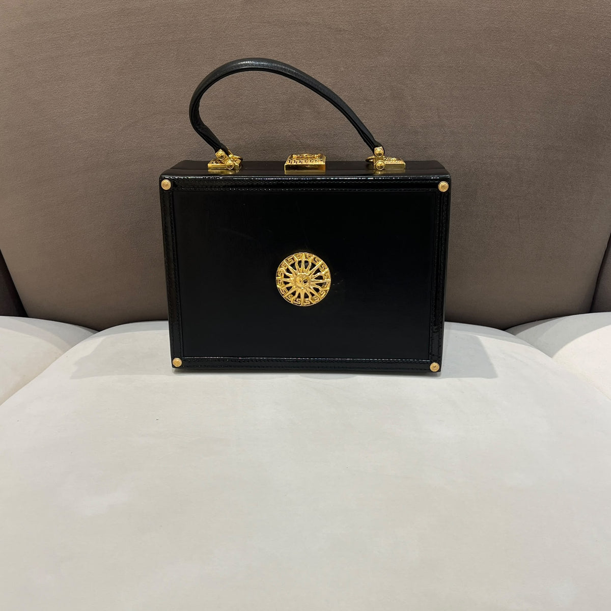 Versace Black Vanity Box Handbag with Gold-Tone Sunburst — front