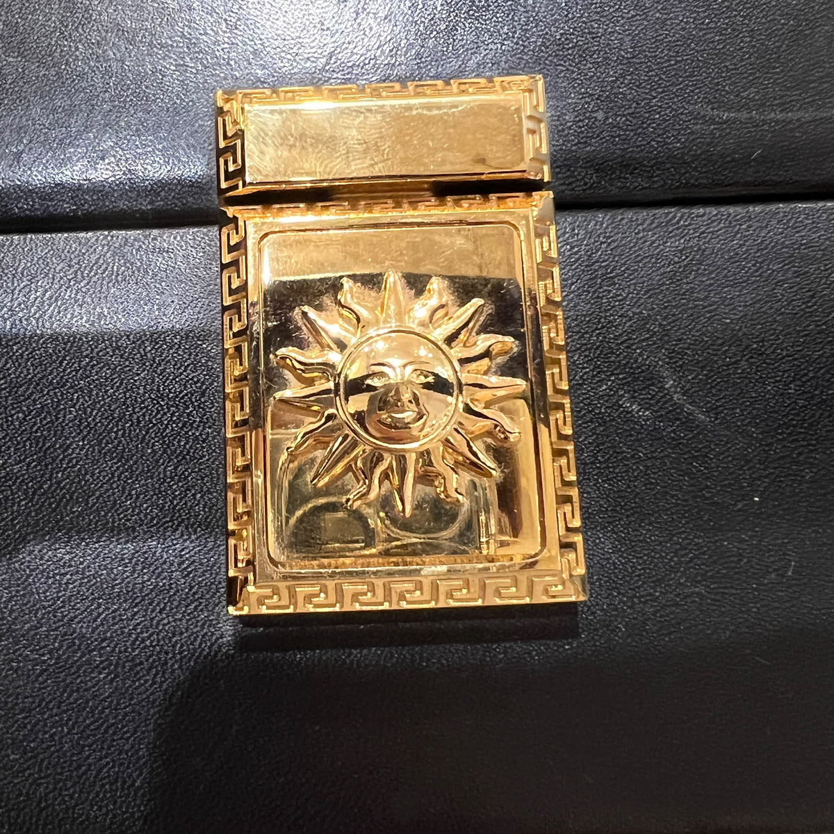 Versace Black Vanity Box Handbag with Gold-Tone Sunburst — sunburst clasp detail