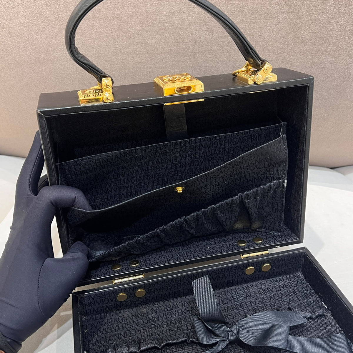Versace Black Vanity Box Handbag with Gold-Tone Sunburst — interior compartments