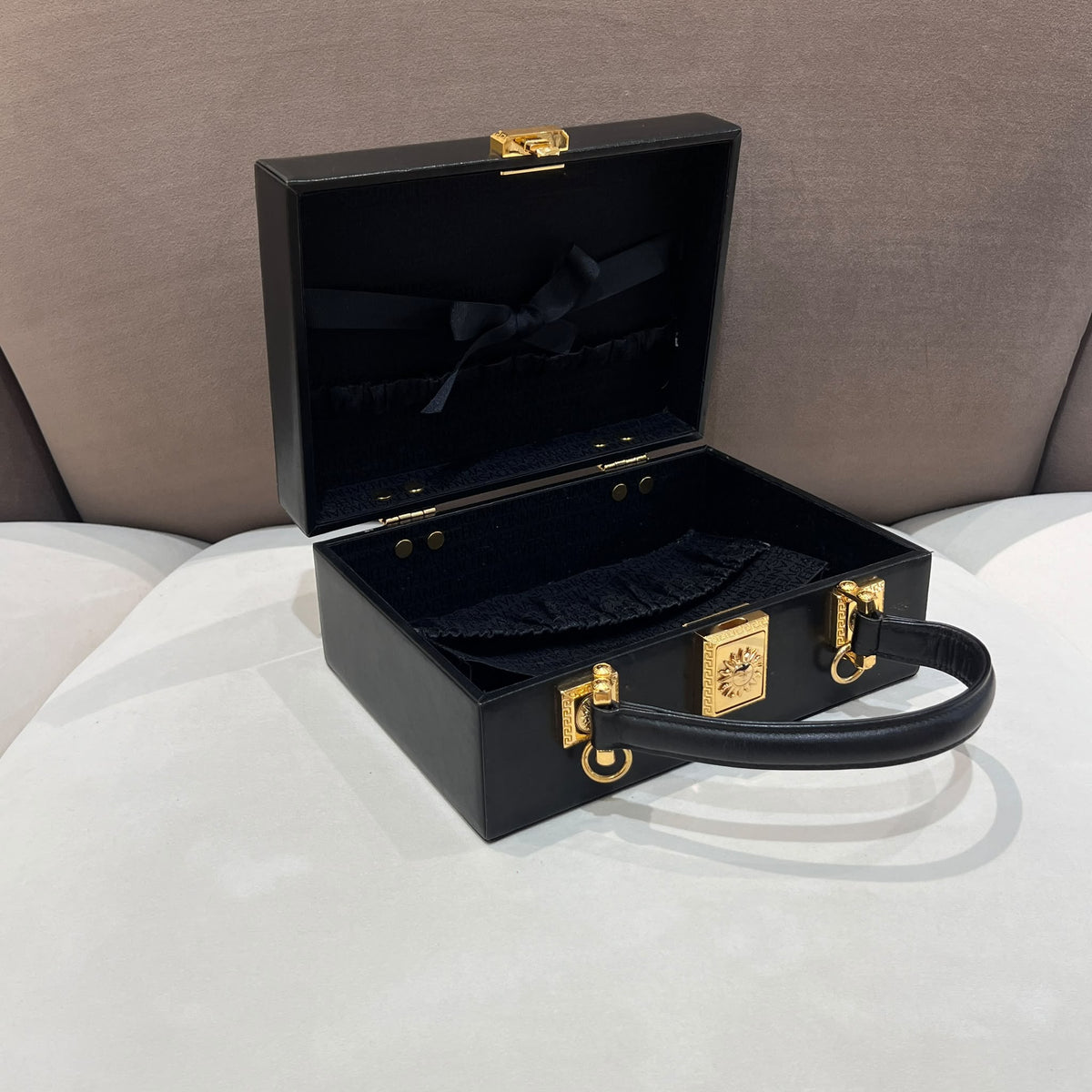 Versace Black Vanity Box Handbag with Gold-Tone Sunburst — open vanity case