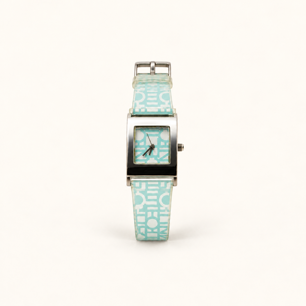 Celine Light Blue Logo Dial Rectangular Quartz Watch — front view on an ivory background