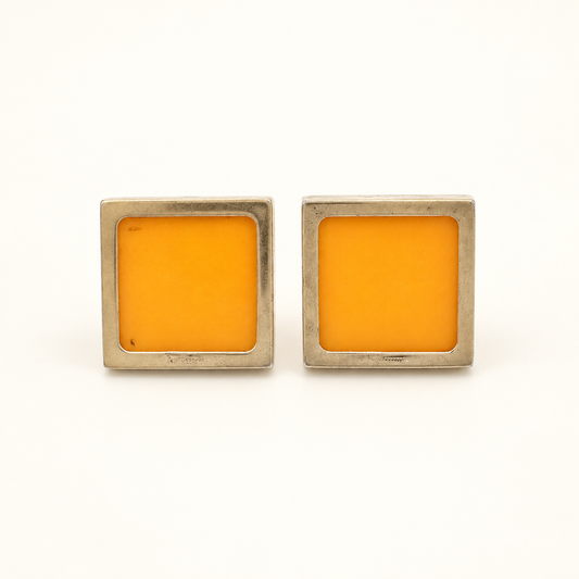 Ferragamo Orange Square Clip-On Earrings — front view on an ivory background