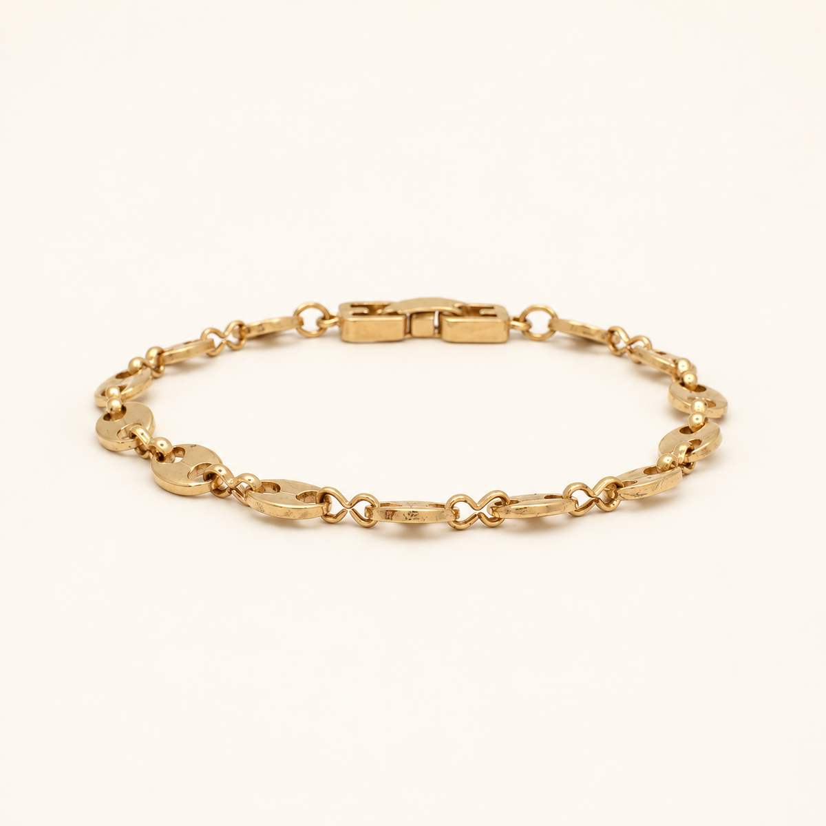 Givenchy Gold-Plated Link Bracelet, 18cm — front view on an ivory background