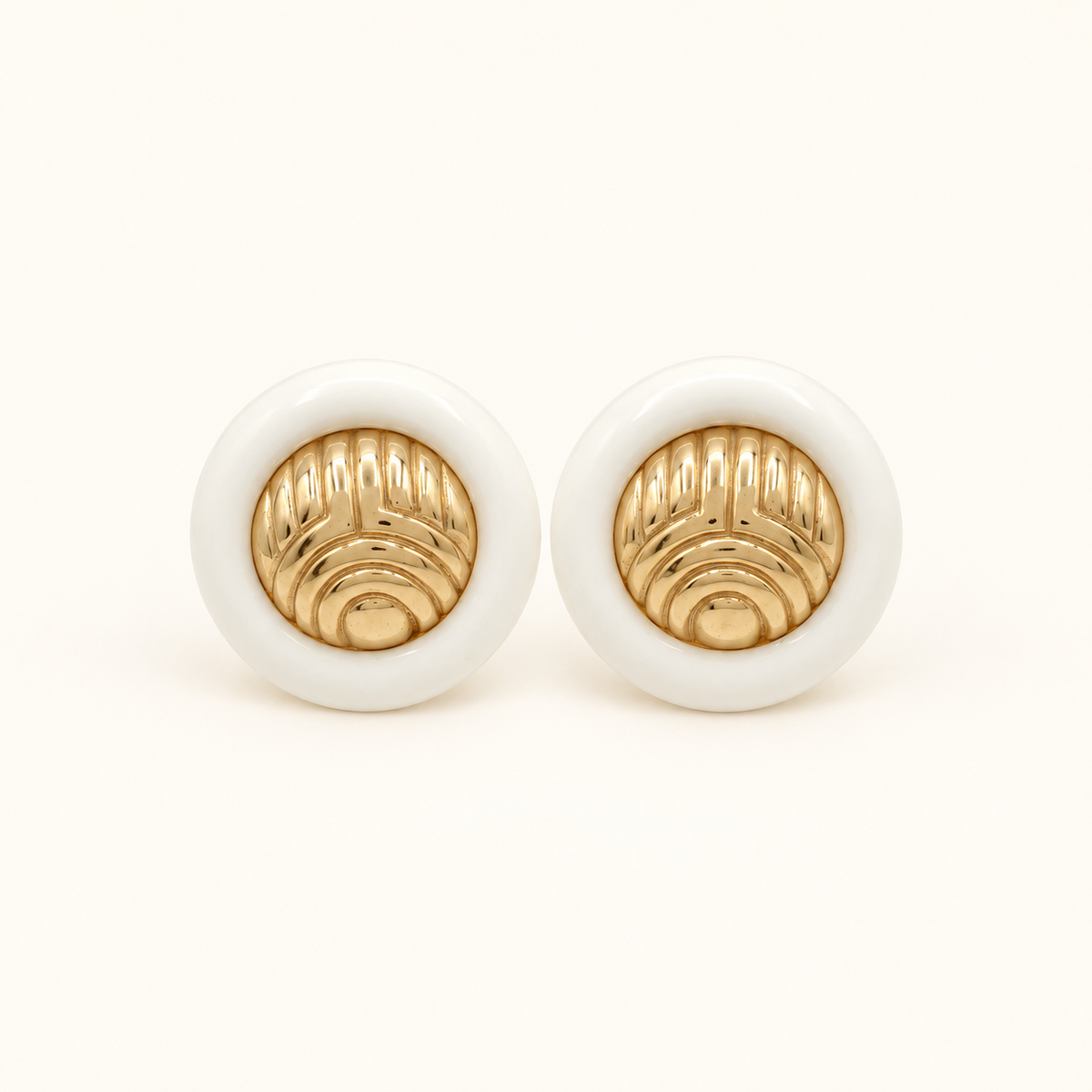 Givenchy White and Gold-Tone Round Clip-On Earrings — front view on an ivory background