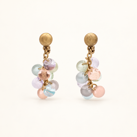 Yves Saint Laurent Pastel Bead Drop Clip-On Earrings — front view on an ivory background