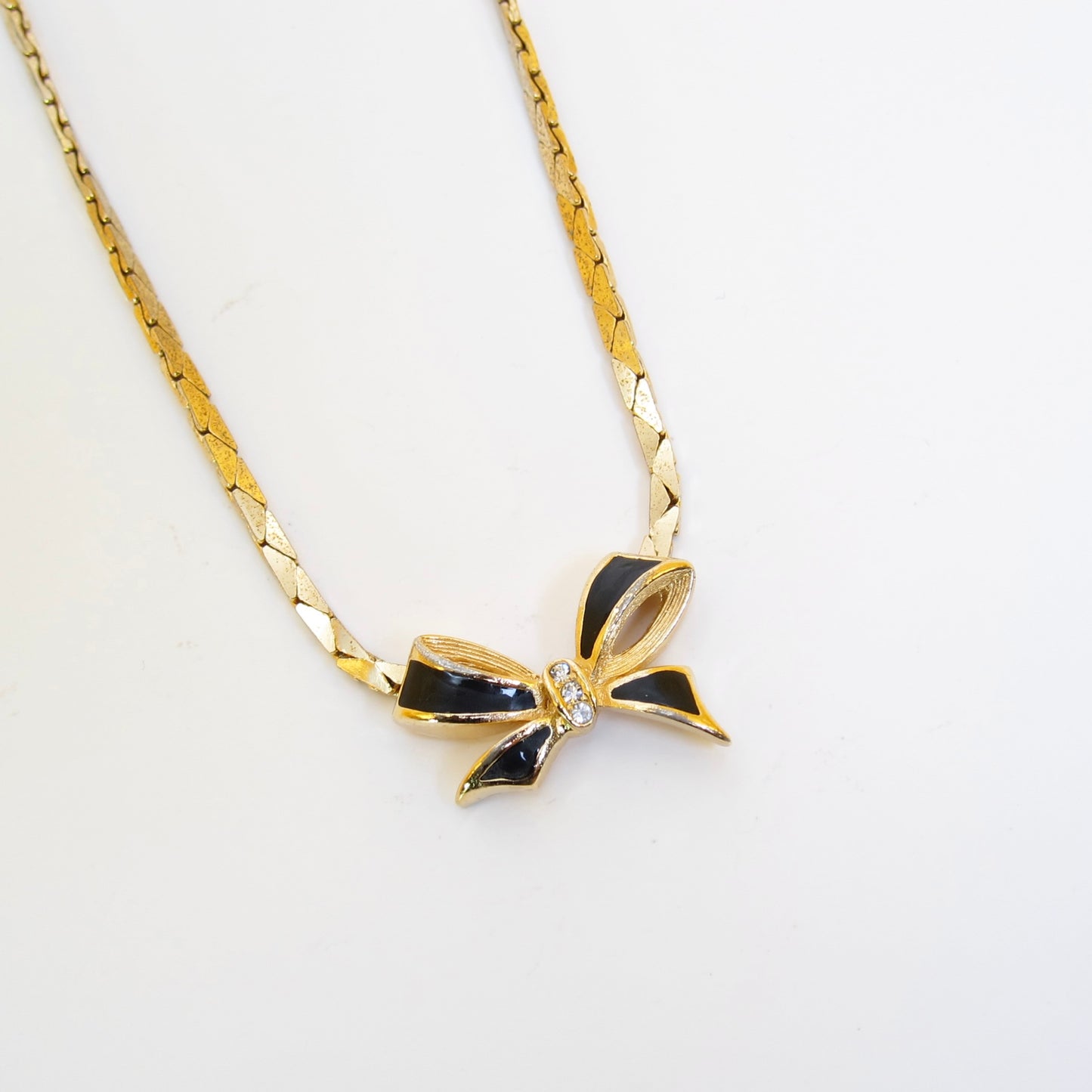 Christian Dior Vintage Ribbon Motif Black and Rhinestone Golden Necklace