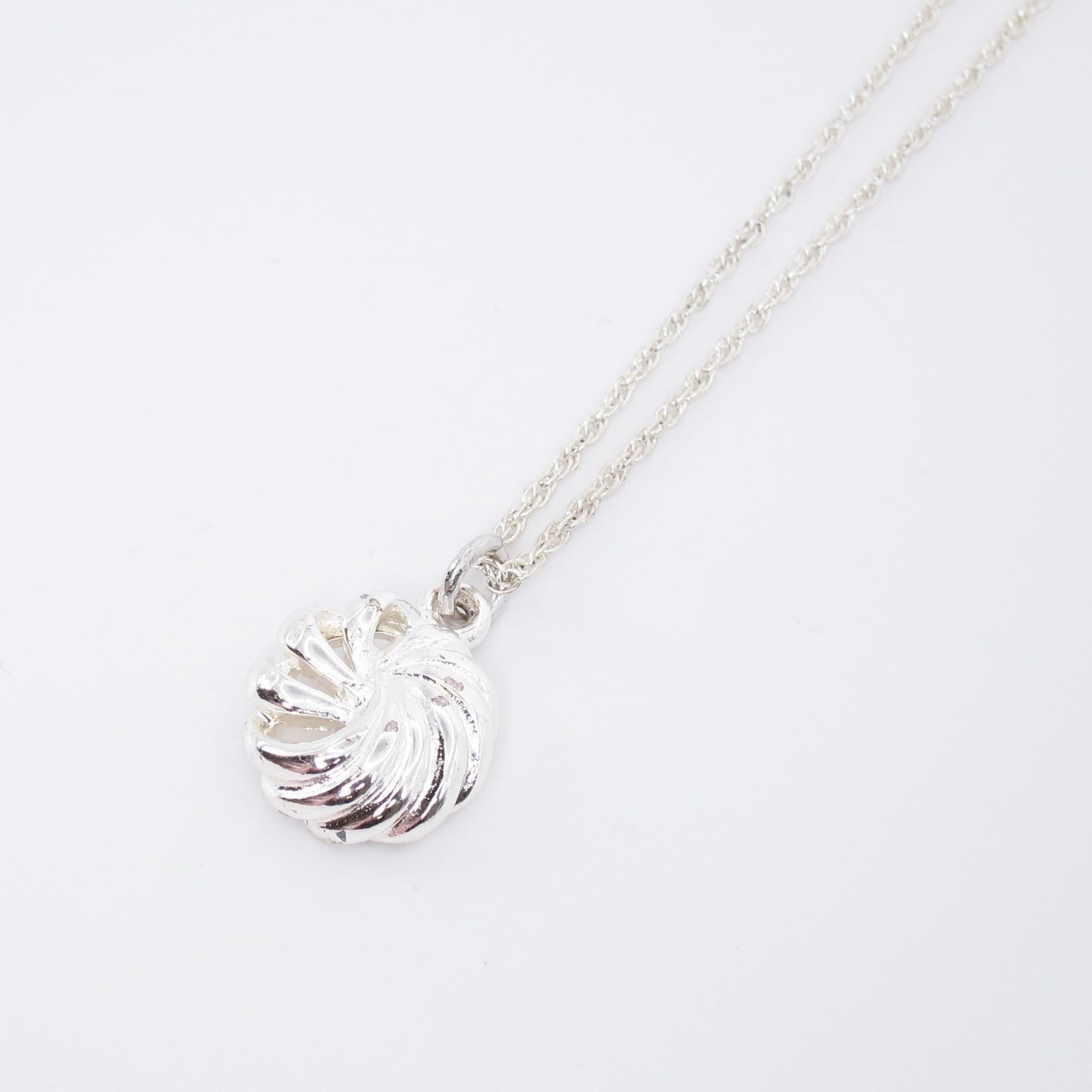 Monet Vintage Swirl Ribbon Pendant Silver Necklace