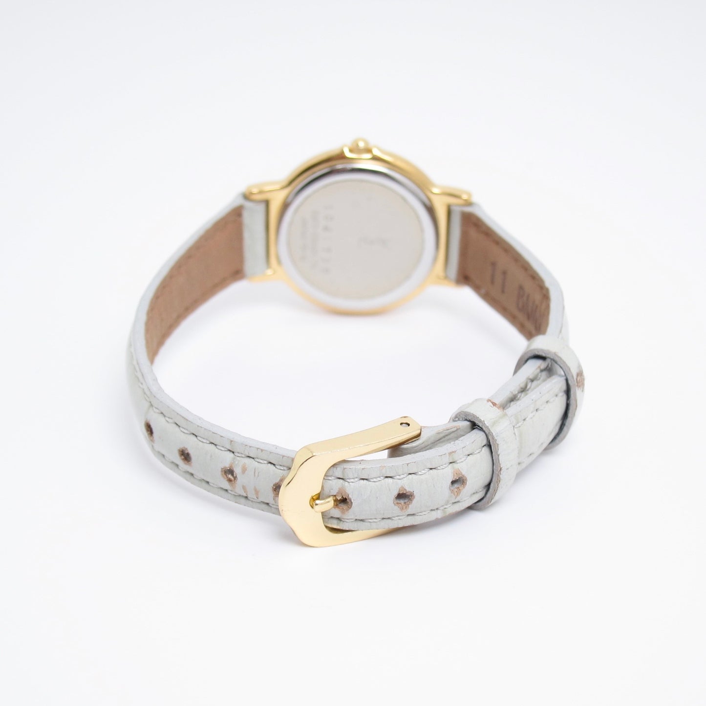 Yves Saint Laurent Vintage Round Champagne Face with Leather Strap Watch