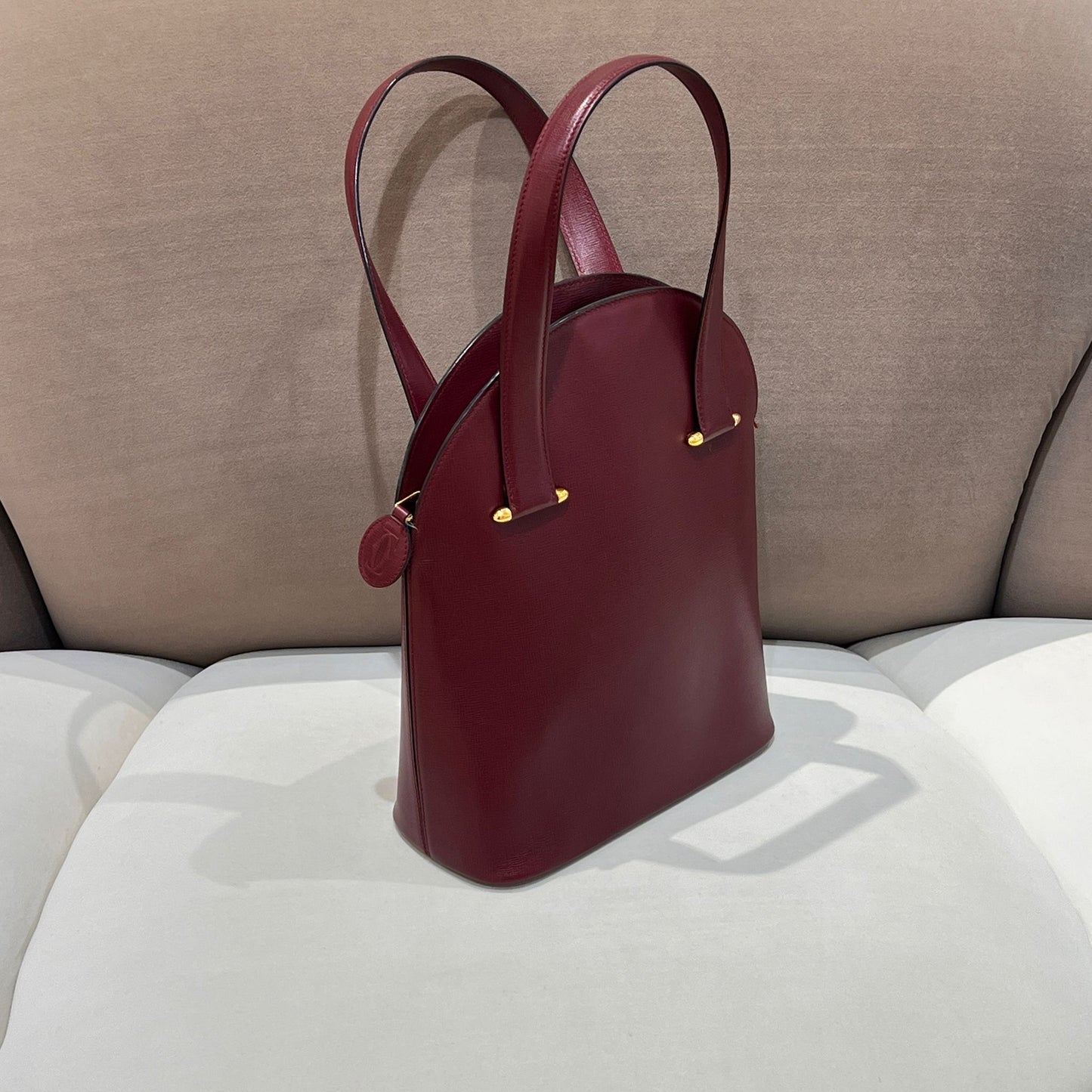 Cartier Vintage Must De Cartier Bordeaux Leather Oval Handbag