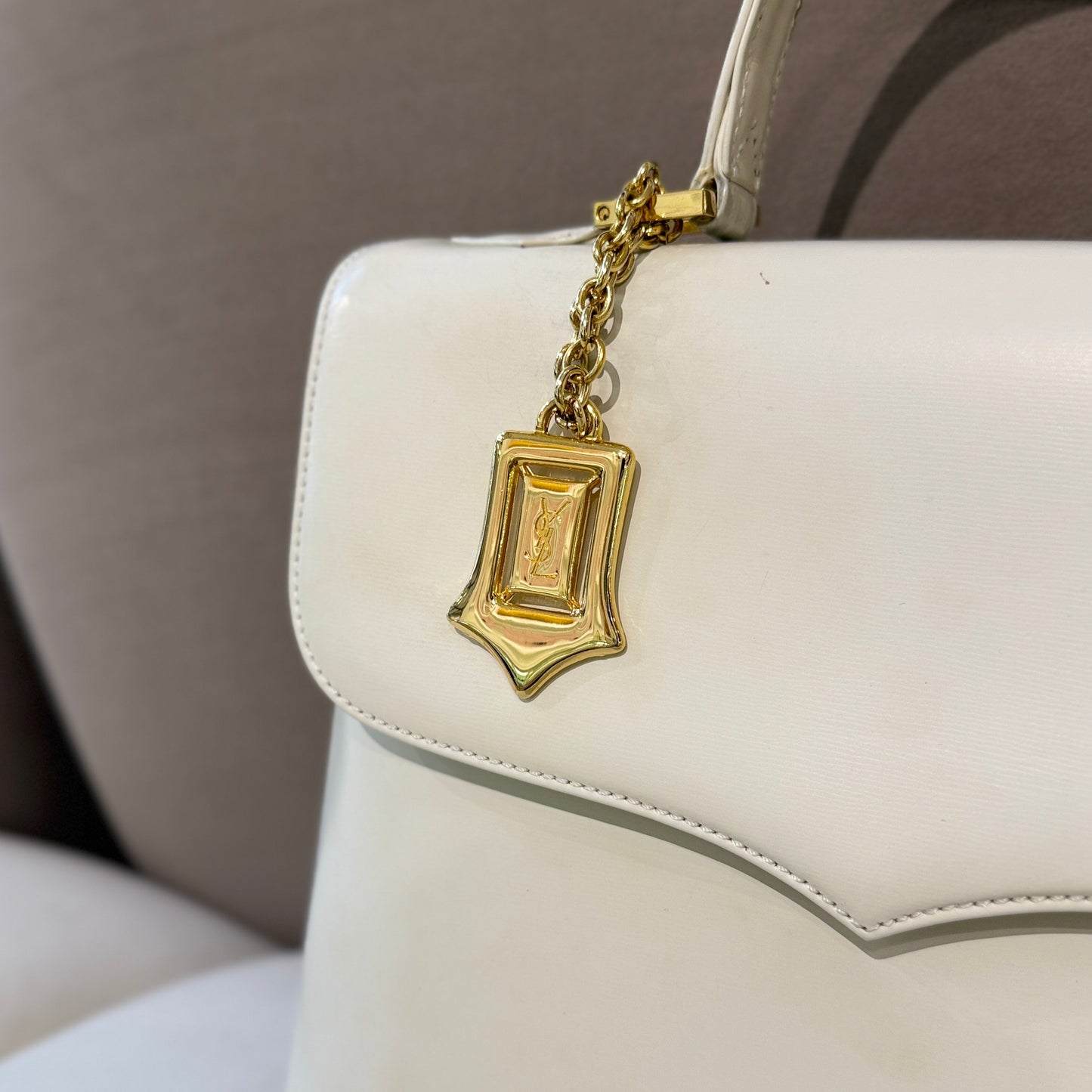 Yves Saint Laurent Vintage White Leather With Golden Logo Charm Top Handle Handbag