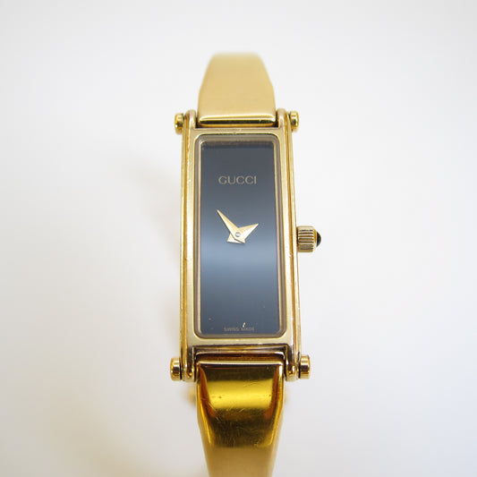 Gucci Vintage Rectangle Black Face Golden Bangle Watch