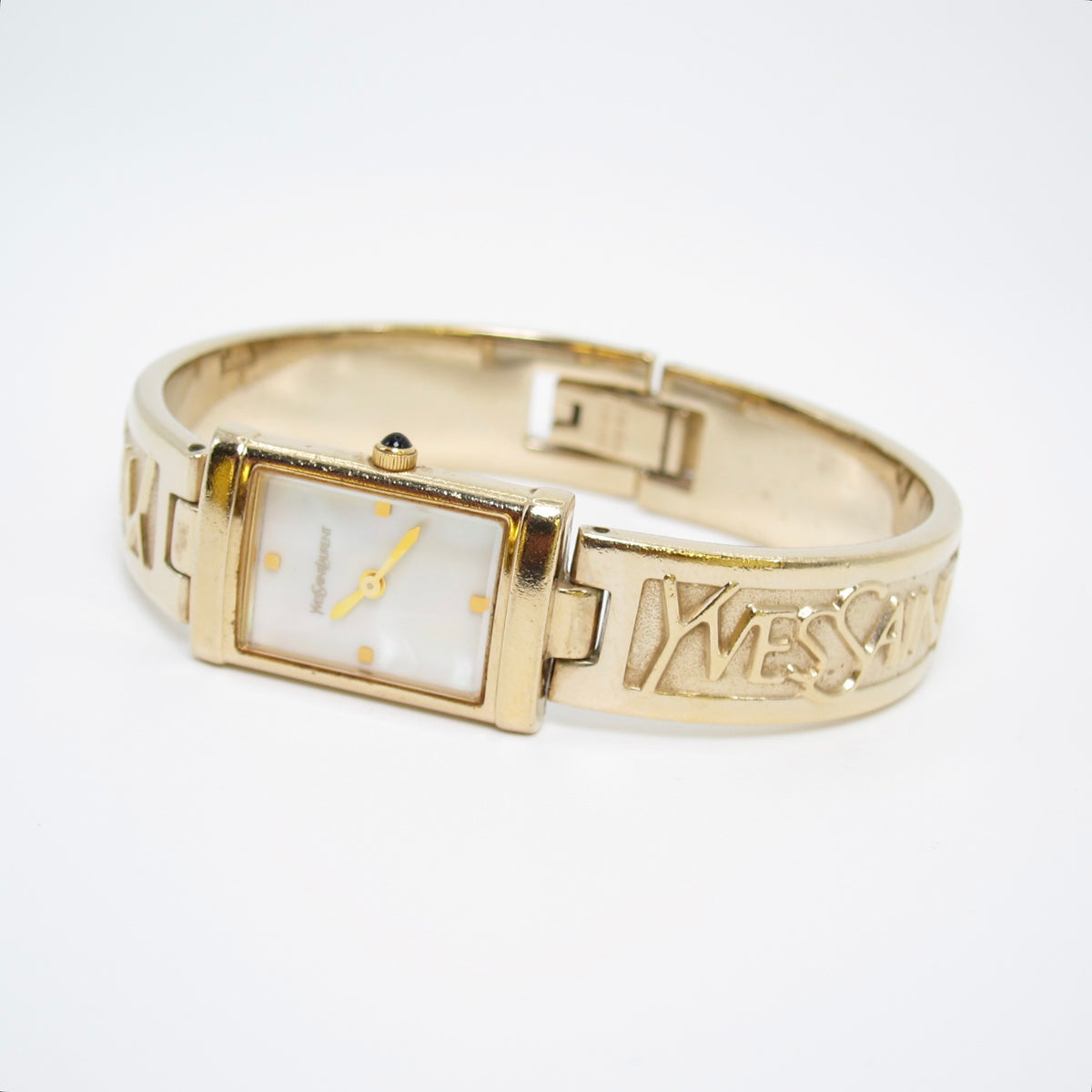 Yves Saint Laurent Vintage Rectangle Shell Pearl Face and Logo Engraved Golden Bangle Watch