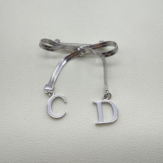 Christian Dior Vintage CD Logo with Ribbon Silver Brooch