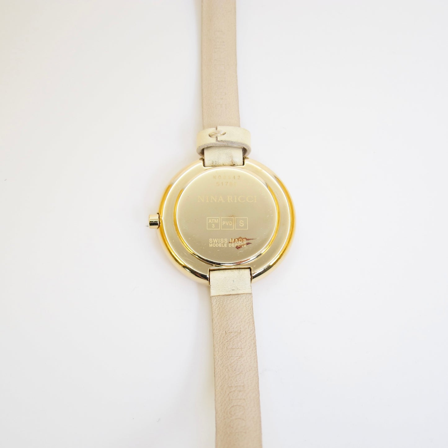 Nina Ricci Vintage Round White Face Golden Watch with Ivory Leather Strap