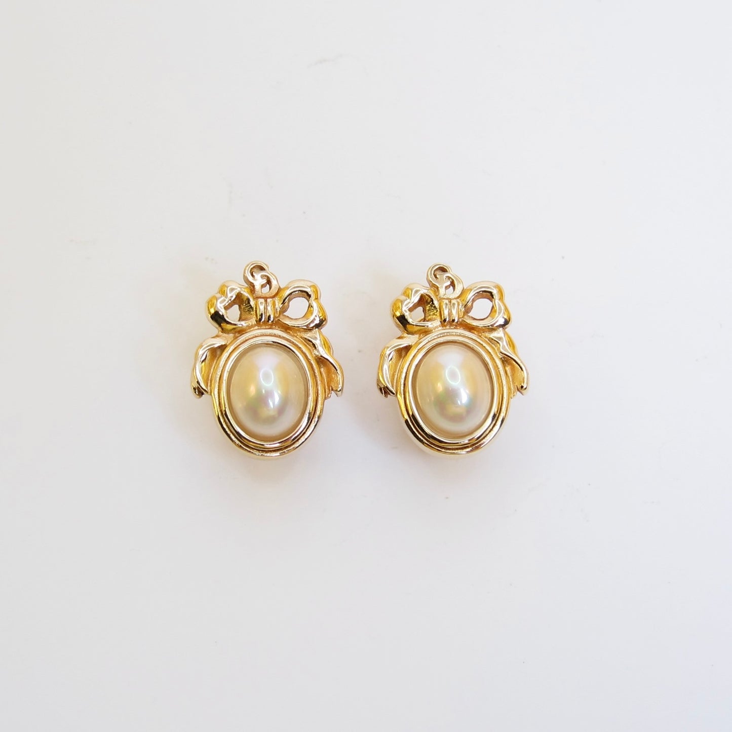 Christian Dior Vintage CD Logo Ribbon and Pearl Golden Clip-on Earrings