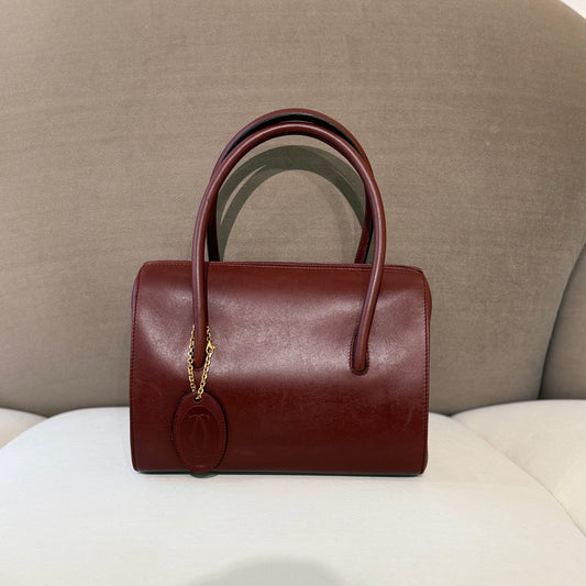 Cartier Must Line Burgundy Red Leather Boston Bag With Golden Chain Logo Charm