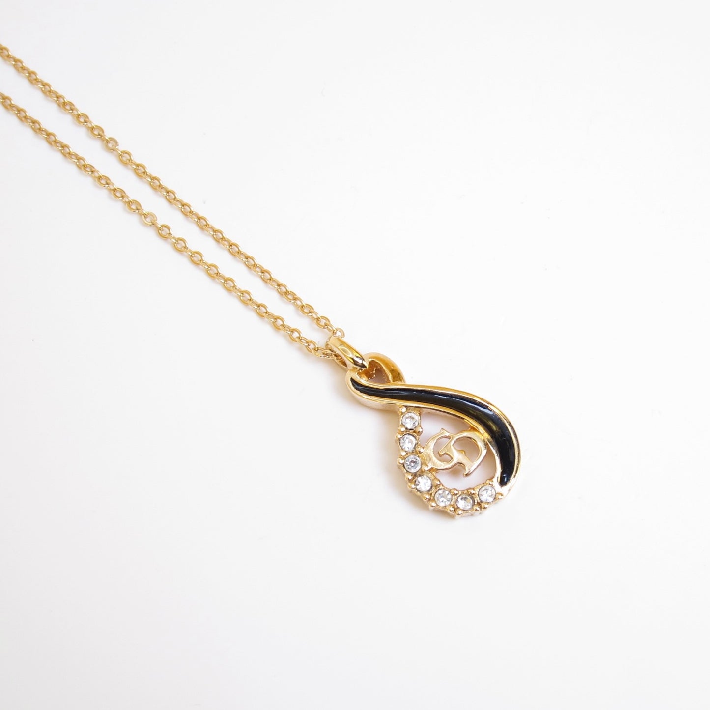 Christian Dior Vintage CD Logo Black and Rhinestone Twist Pendant Golden Necklace