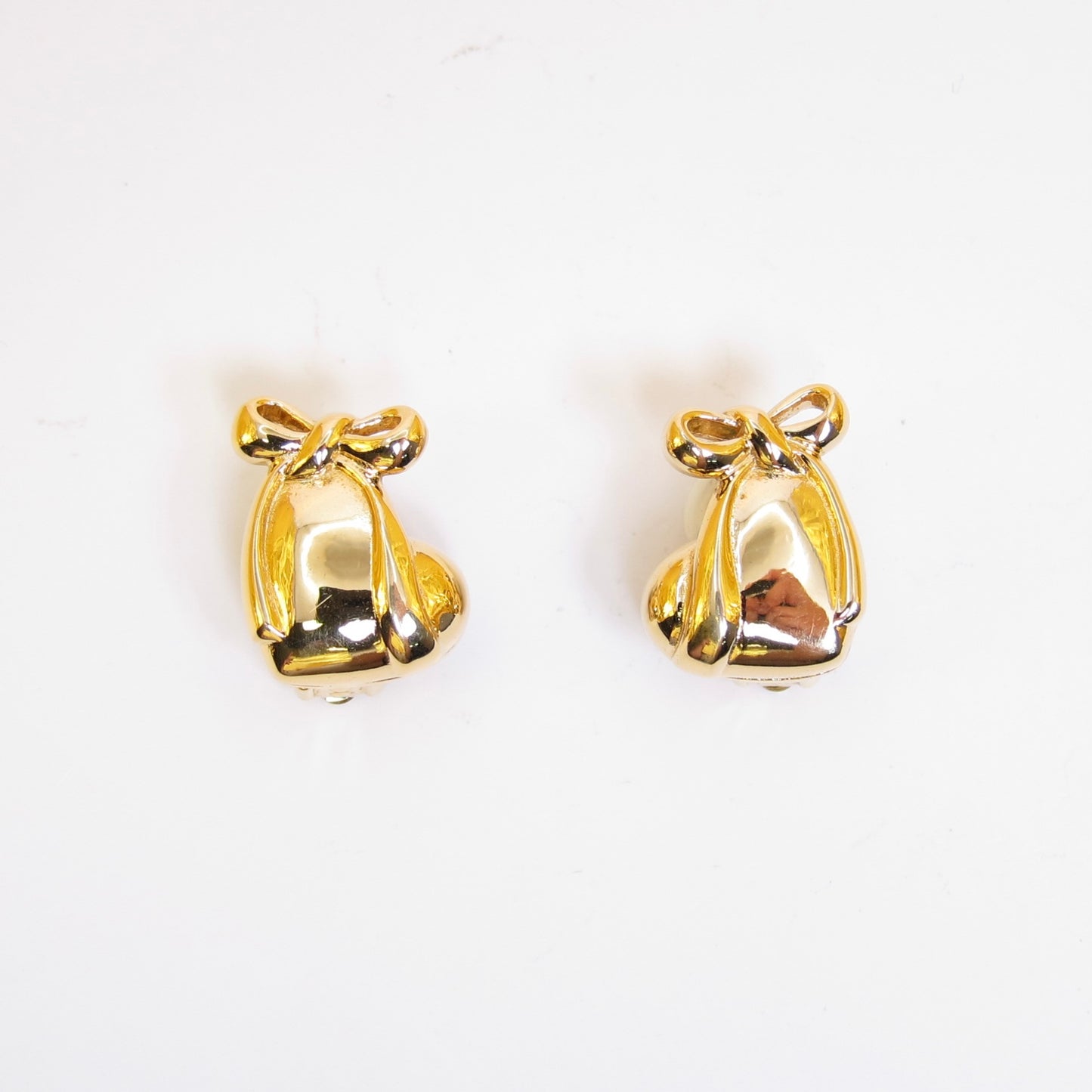 Nina Ricci 絲帶金色夾式耳環