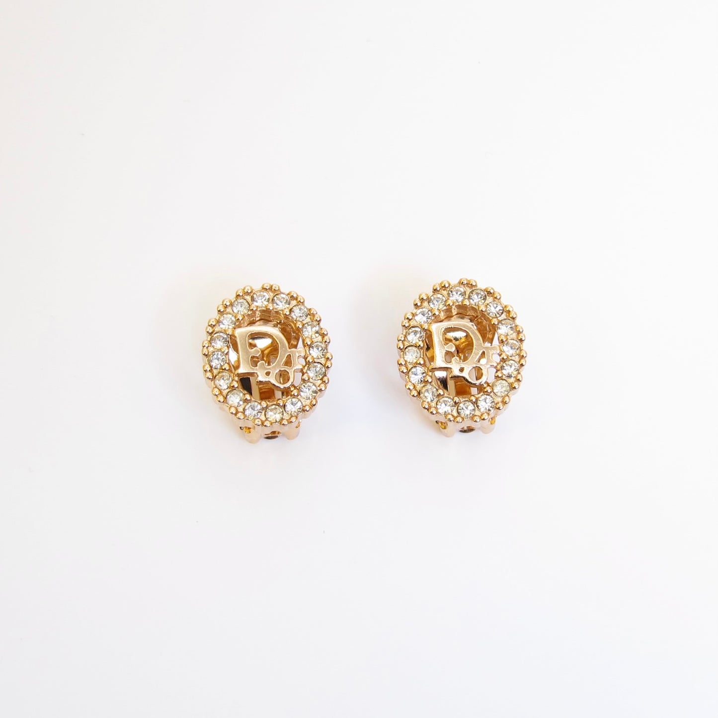 Christian Dior Vintage Dior Logo in Oval Shape with Rhinestone Golden Clip-on Earrings