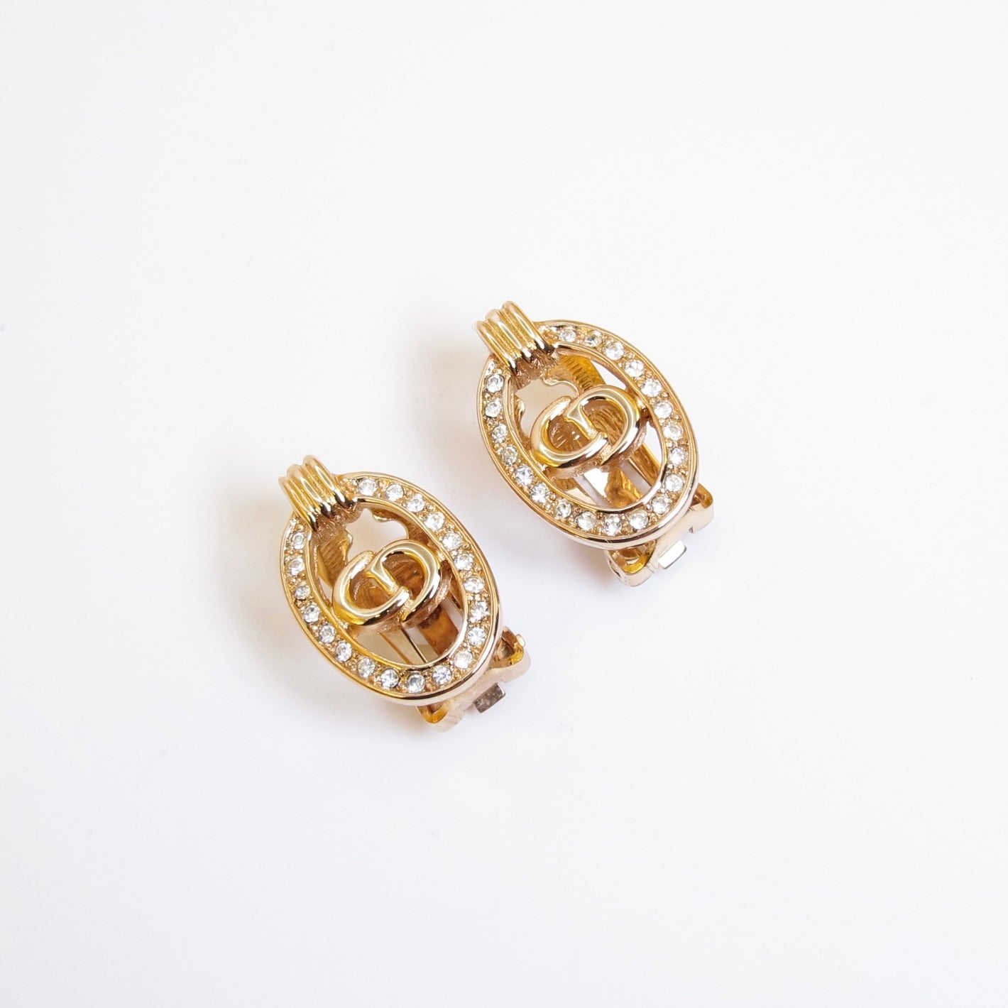 Christian Dior Vintage CD Logo in Oval Shaped with Rhinestone Golden Clip-on Earrings