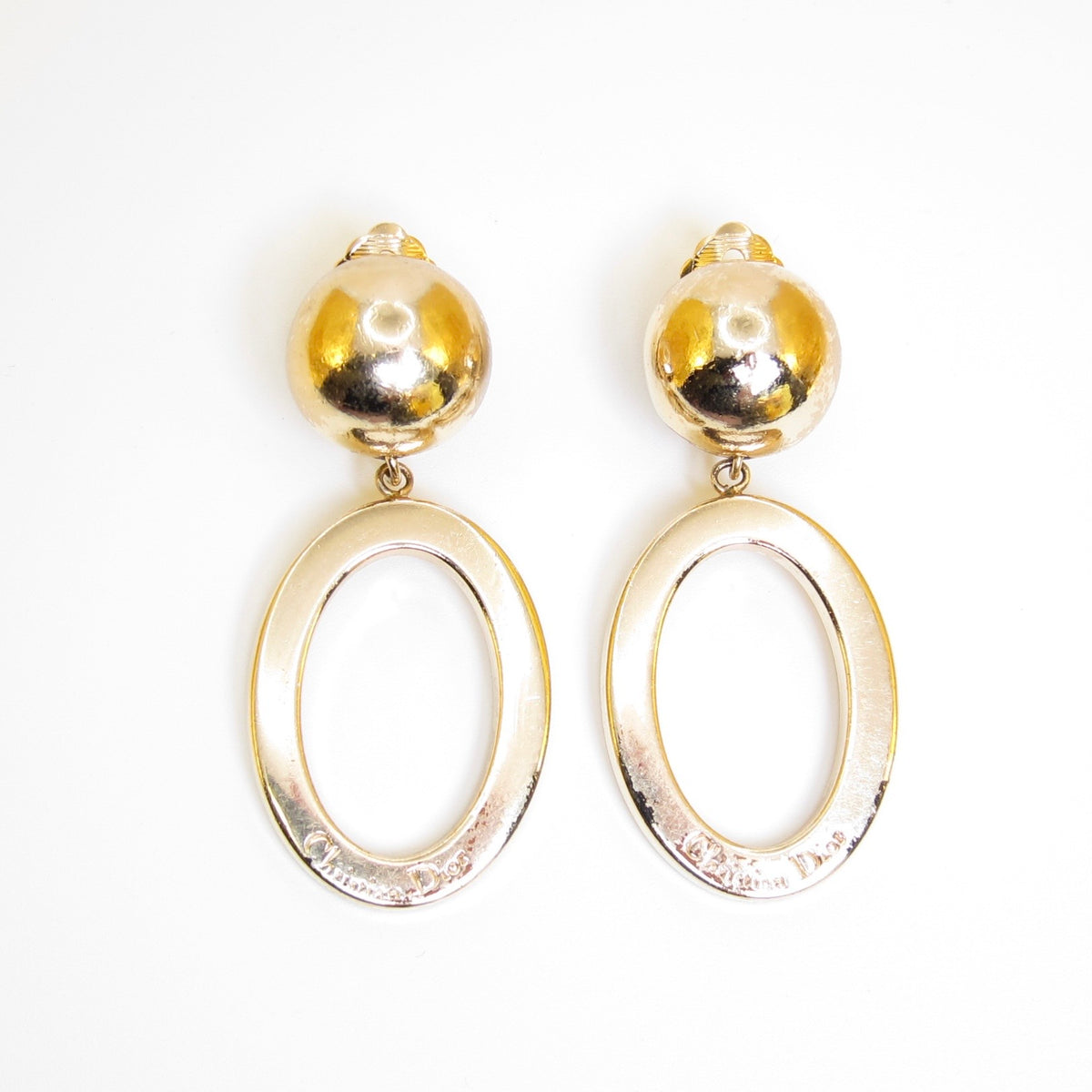 Christian Dior 金色橢圓垂墜夾式耳環