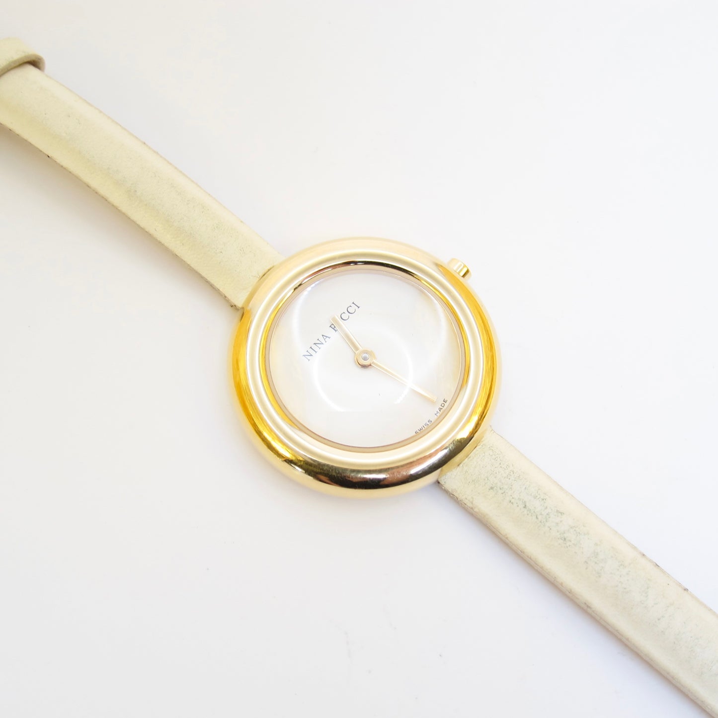 Nina Ricci Vintage Round White Face Golden Watch with Ivory Leather Strap