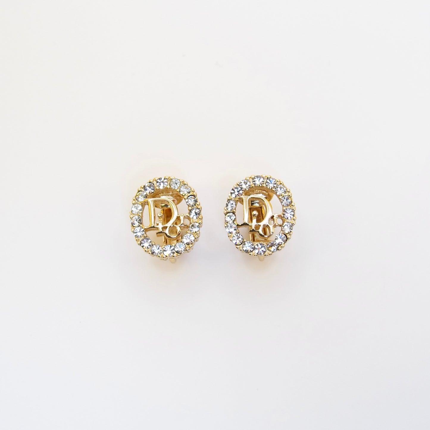 Christian Dior Vintage Dior Logo in Oval Shape with Rhinestone Golden Clip-on Earrings