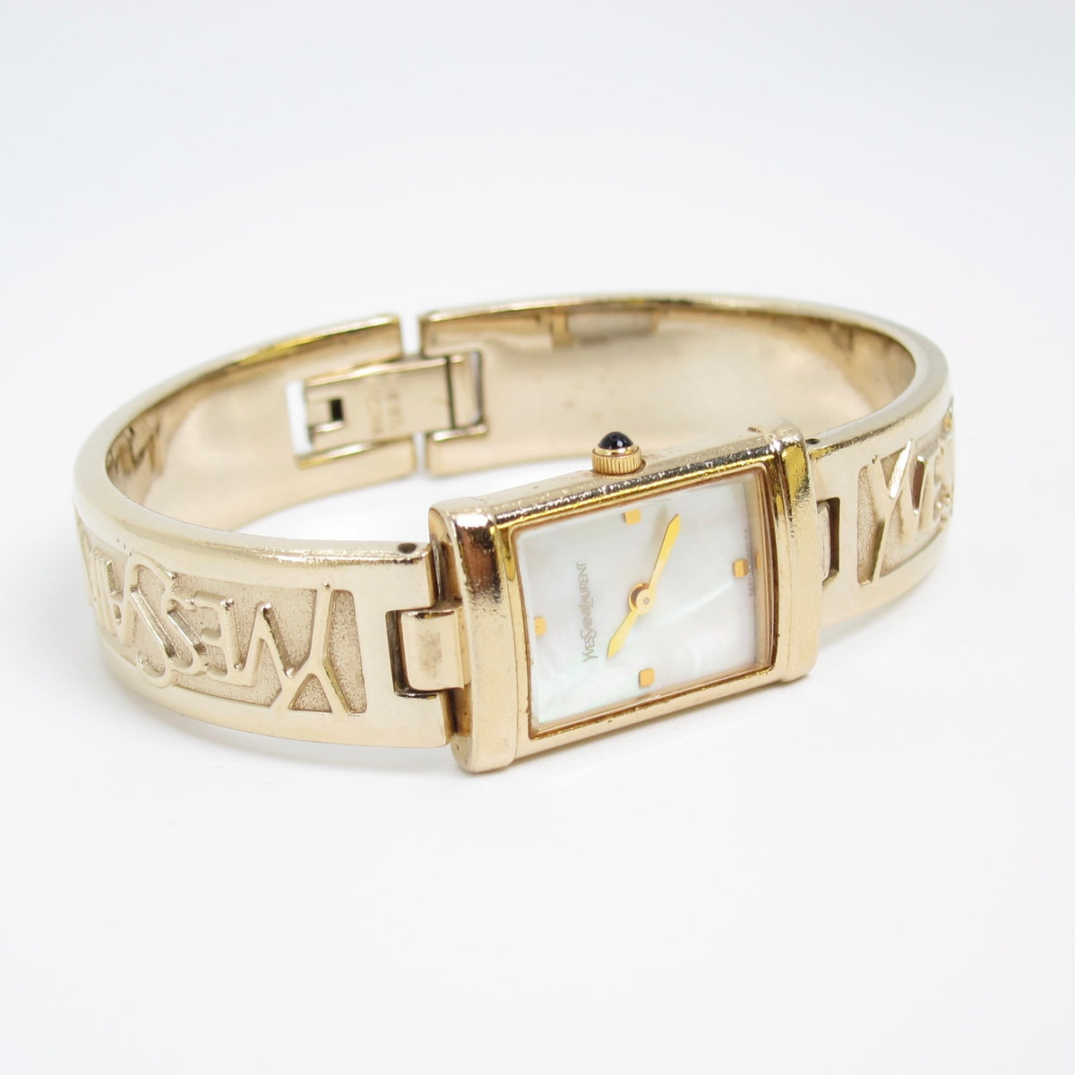 Yves Saint Laurent Vintage Rectangle Shell Pearl Face and Logo Engraved Golden Bangle Watch