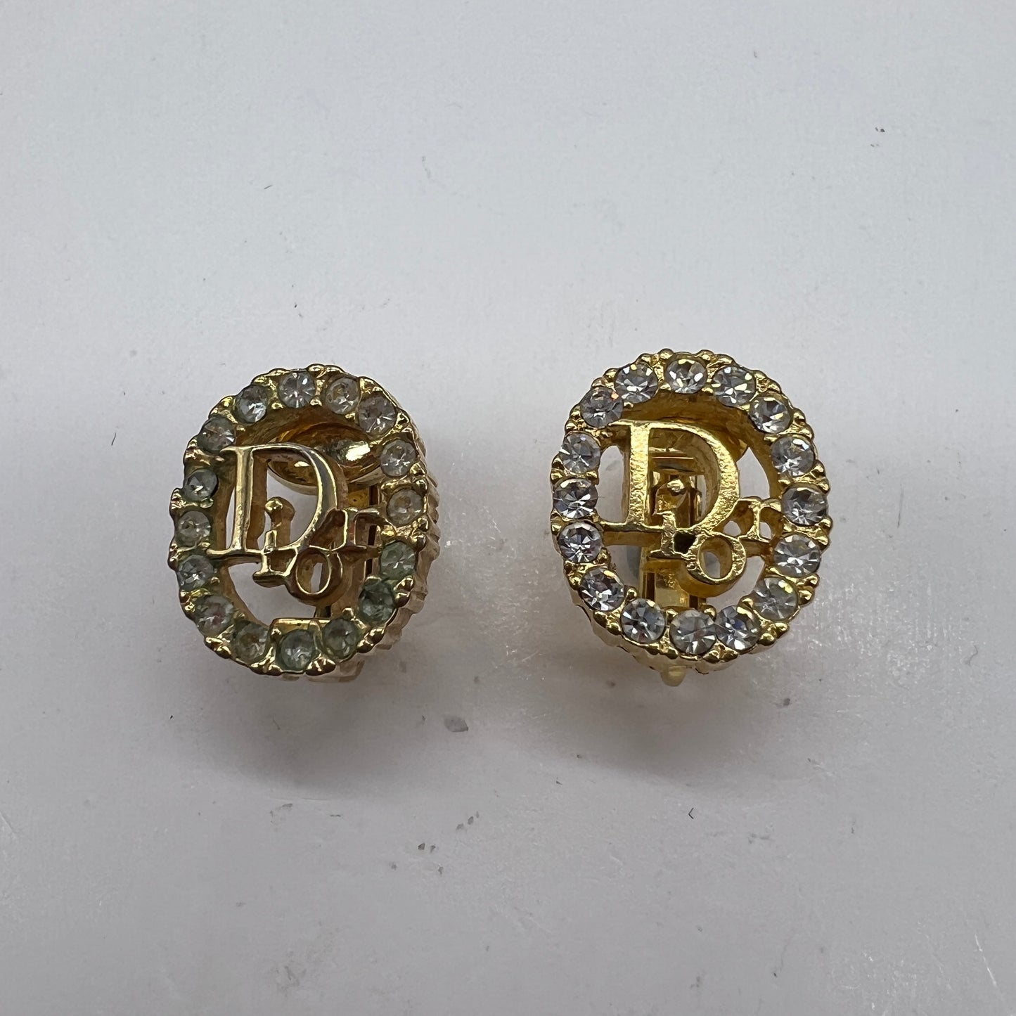 Christian Dior Vintage Oval Logo with Rhinestone Embellished Golden Clip-On Earrings