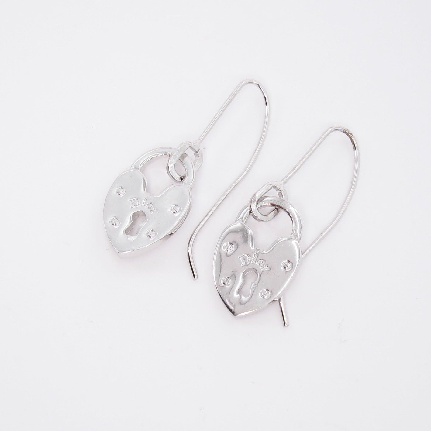 Christian Dior Vintage Dior Logo on Heart Lock Dangle Silver Earrings