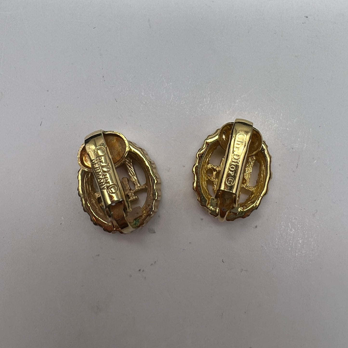 Christian Dior Vintage Oval Logo with Rhinestone Embellished Golden Clip-On Earrings