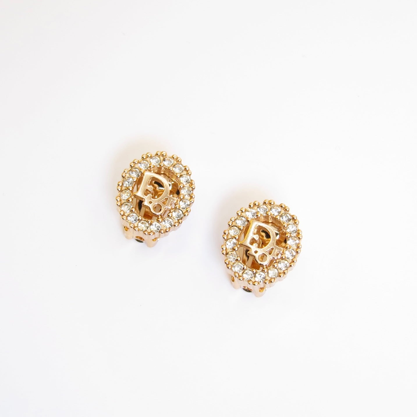 Christian Dior Vintage Dior Logo in Oval Shape with Rhinestone Golden Clip-on Earrings