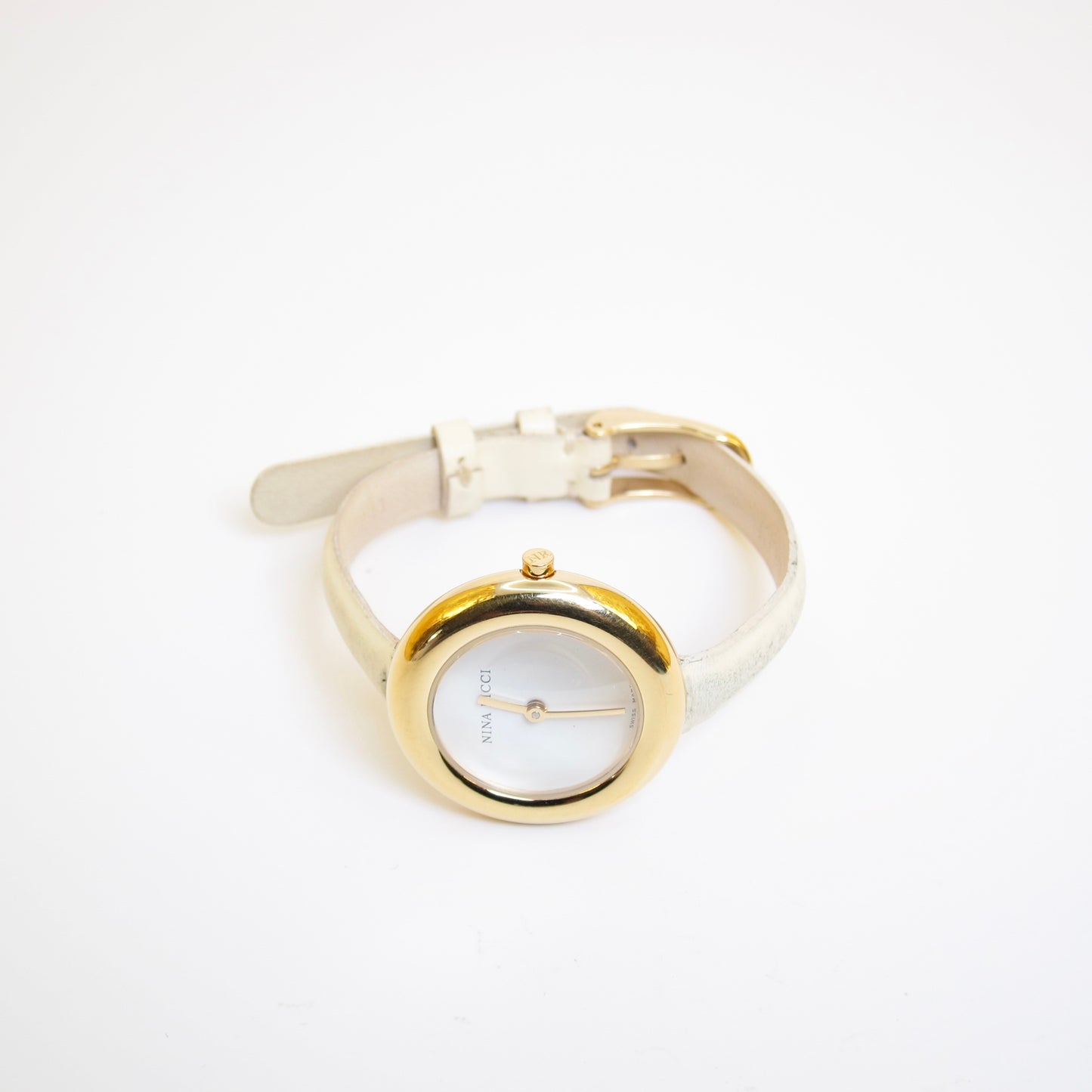 Nina Ricci Vintage Round White Face Golden Watch with Ivory Leather Strap