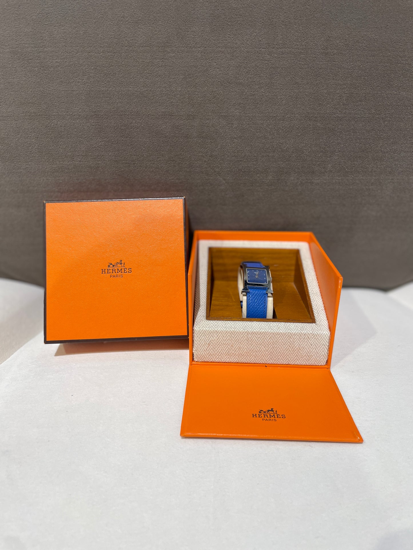 Hermes Vintage Blue Face Stainless Steel H Watch With Blue Leather Strap
Product Of 1997
With Original Box