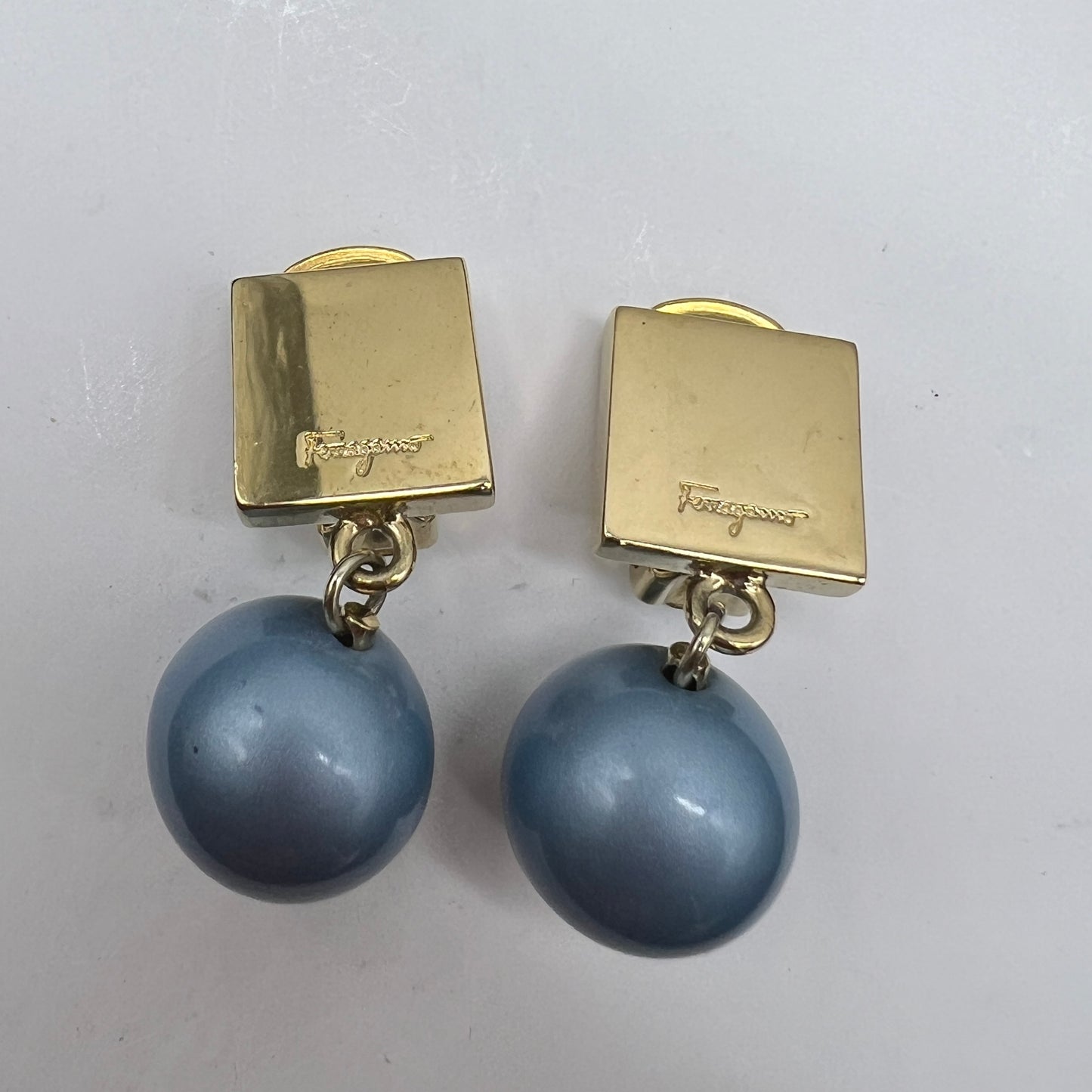 Ferragamo Vintage Golden Square X Blue Sphere Clip-On Earring