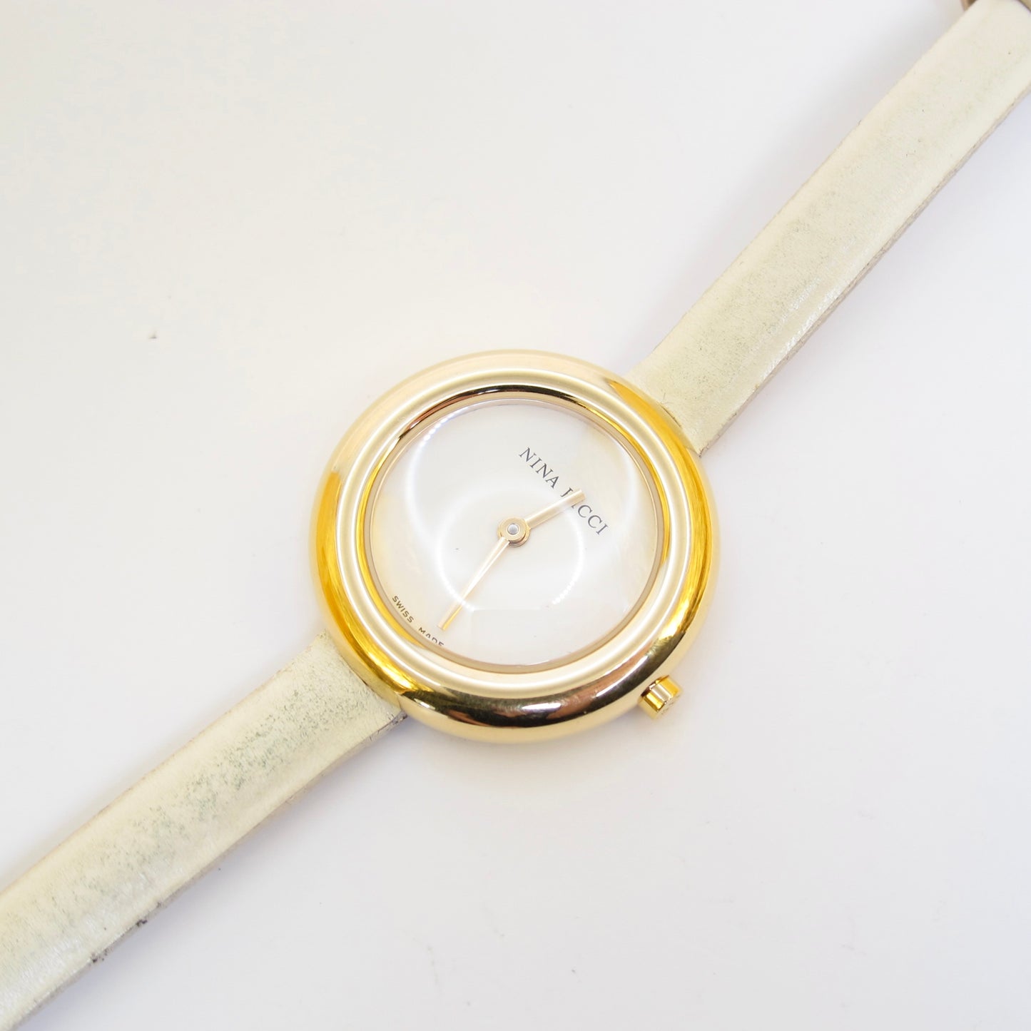 Nina Ricci Vintage Round White Face Golden Watch with Ivory Leather Strap