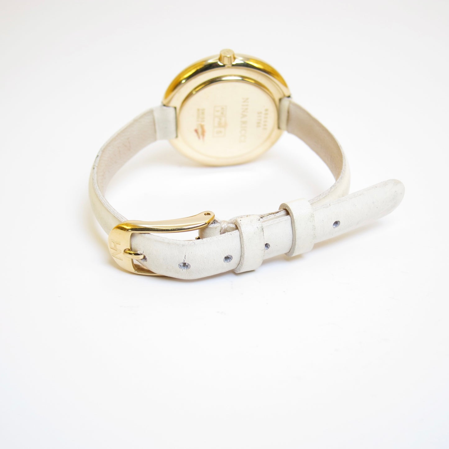 Nina Ricci Vintage Round White Face Golden Watch with Ivory Leather Strap