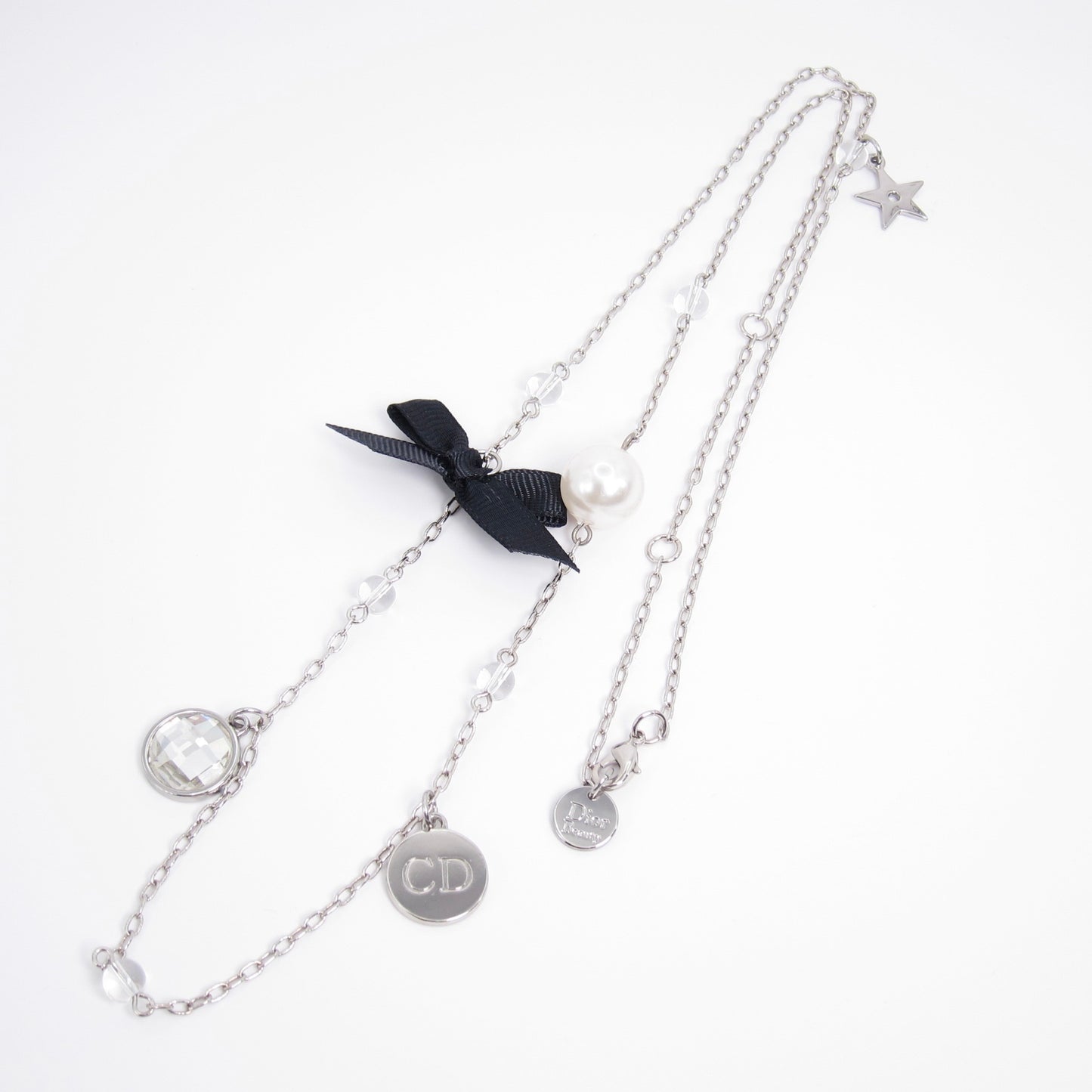 Christian Dior Vintage CD Logo Pearl Ribbon and Charms Silver Long Necklace