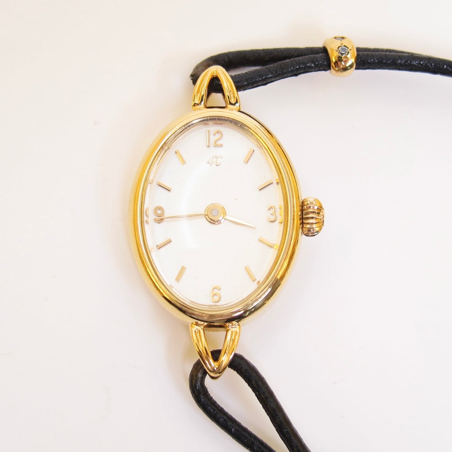 4°C Vintage Oval White Dial Black Leather Cord Bracelet Watch