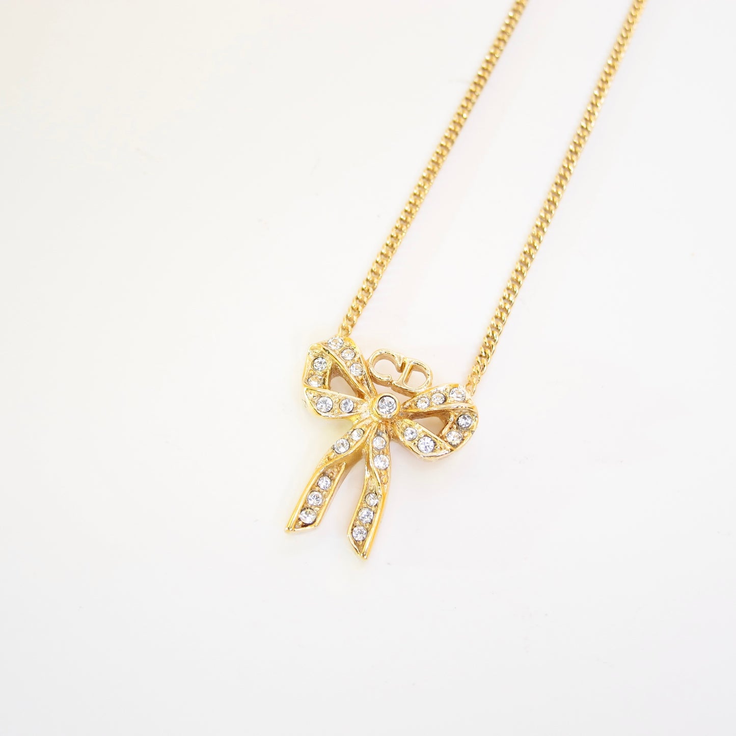 Christian Dior Vintage CD Logo and Ribbon with Rhinestone Golden Necklace