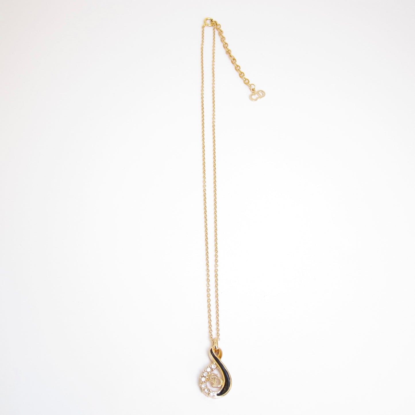 Christian Dior Vintage CD Logo Black and Rhinestone Twist Pendant Golden Necklace