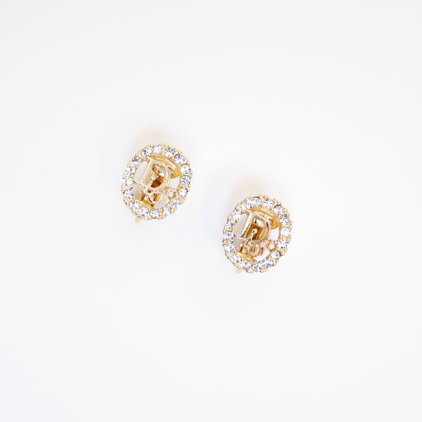 Christian Dior Vintage Dior Logo in Oval Shape with Rhinestone Golden Clip-on Earrings