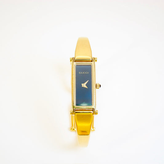 Gucci Vintage Rectangle Black Face Golden Bangle Watch