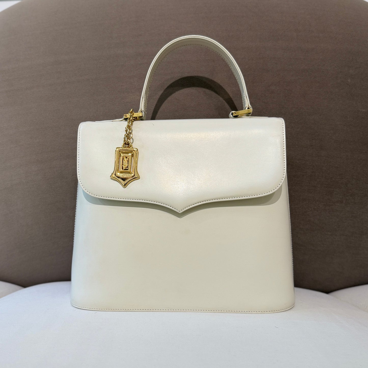 Yves Saint Laurent Vintage White Leather With Golden Logo Charm Top Handle Handbag